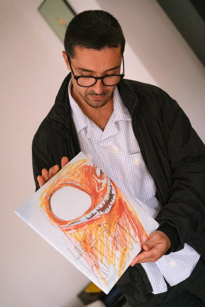 Looking over a hand-drawn record sleeve